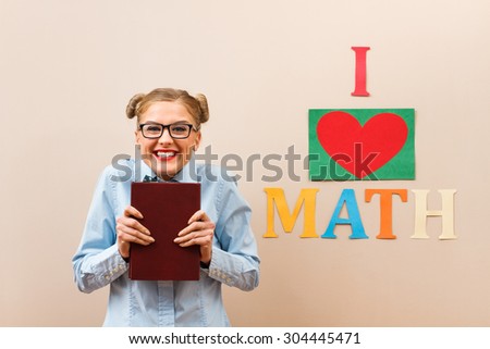 Portrait of cute geek girl who loves math.I love math!