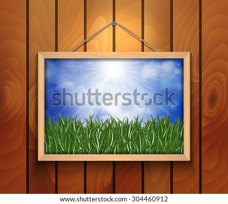 Illustration of picture with green grass, blue sky and clouds on wooden background
