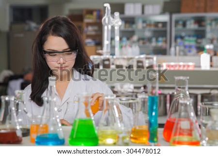 Technicien in chemical laboratory with space in photo for put your text