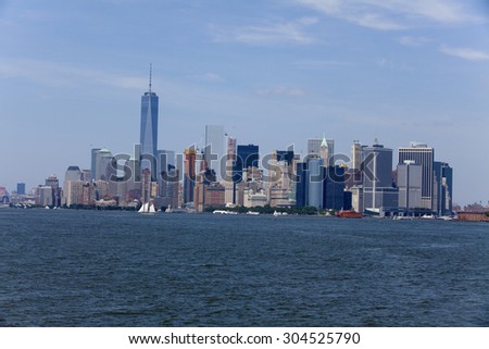 Lower Manhattan in New York City in the background. The new World Trade Center Freedom Tower as seen 
Summer 2015