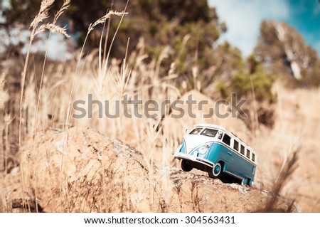 Cute blue retro travelling van. Macro photo