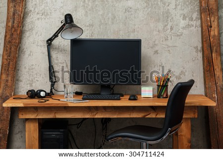 Modern workplace with computer Royalty-Free Stock Photo #304711424