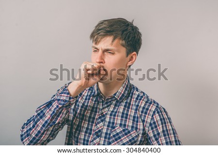 man coughing