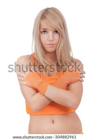 Fair-haired girl on occupations by gymnastics, isolated on white background.