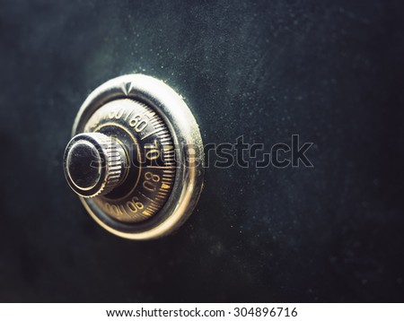 Safe lock code on safety box bank Royalty-Free Stock Photo #304896716