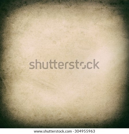 Used paper texture. Grungy cardboard. Vintage style background with vignette