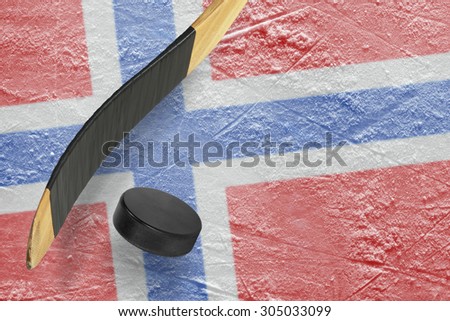 Hockey puck, stick and a fragment of an image of the Norwegian flag
