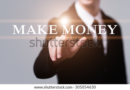 business, technology and internet concept - businessman pressing make money button on virtual screens