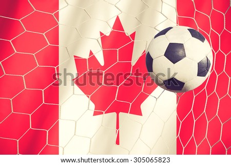 soccer ball on canada flag vintage color 