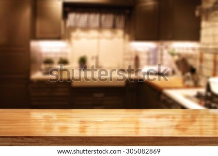 blurred background of red kitchen interior and free space for your composition 