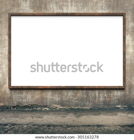 Blank advertising billboard with rusty frame on a dirty grunge wall.
