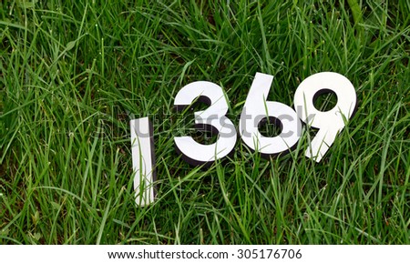 Picture of a Numbers on a  fresh green grass