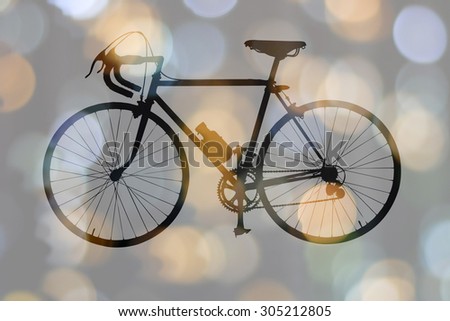 Double exposure of bike and light bokeh