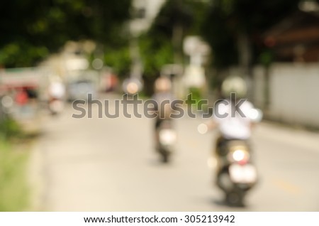Blurred bike on road in Chiangmai Thailand