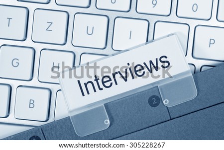 Interviews - folder on computer keyboard