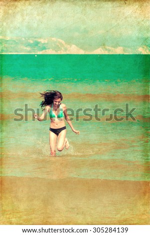 vintage style picture of a cute young girl at the beach