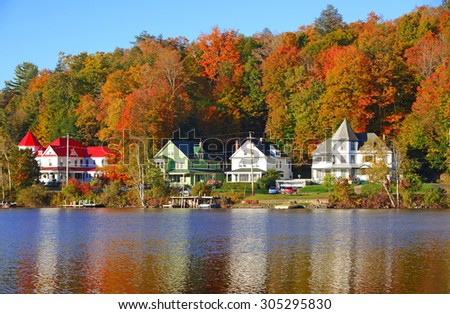 Reflection in Saranac Lake, Autumn in the Adirondacks, New York Royalty-Free Stock Photo #305295830