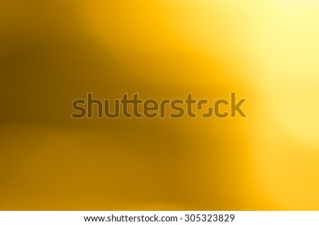 abstract defocused light golden color background texture Royalty-Free Stock Photo #305323829