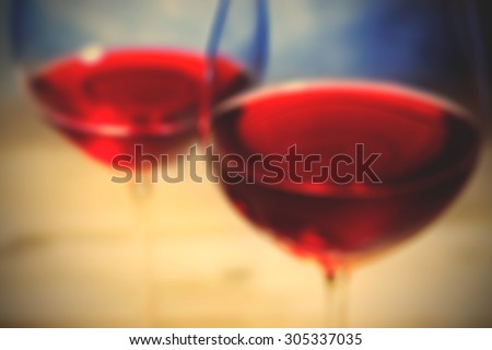 red wine in glass. romantic blur. instagram image filter retro style