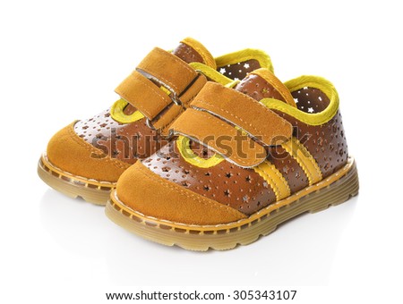 Children's shoes isolated over the white background