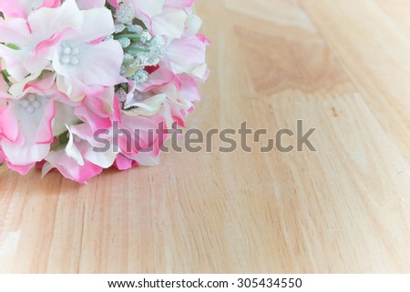 Pink Hydrangea on wood table, old picture style
