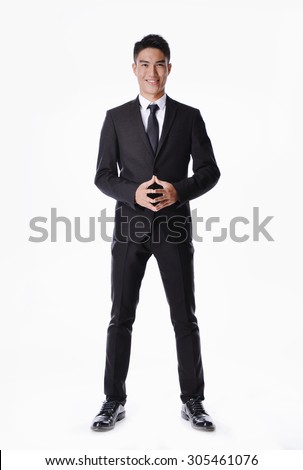 Handsome businessman portrait full body Royalty-Free Stock Photo #305461076