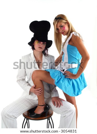 Alice in Wonderland and the Mad Hatter, girls in costumes