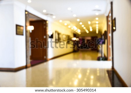 blurred hallway with photo frames