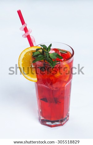Fruit cocktail with fruits.Fruit Ice Tea. Iced juice.Cocktail with ice and citrus on white background. Glass of ice tea