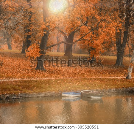 Autumn scene with boats