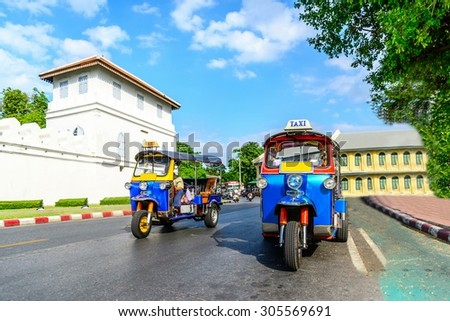 Blue Tuk Tuk, Thai traditional taxi in Bangkok Thailand. Royalty-Free Stock Photo #305569691