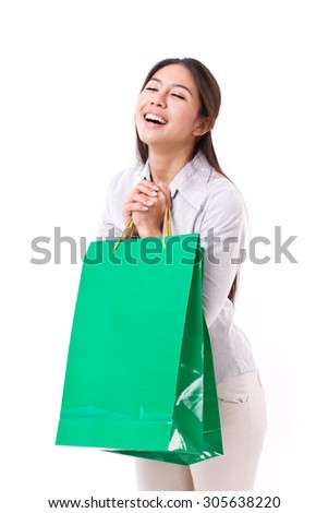 happy woman with shopping bag