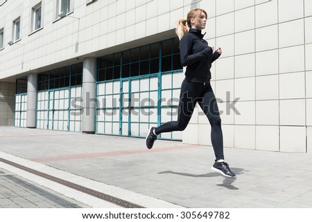 Photo of an athletic woman doing fitness