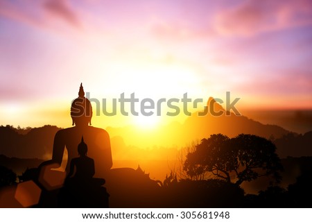 Silhouette of Buddha on on sunset.end of Buddhist Lent