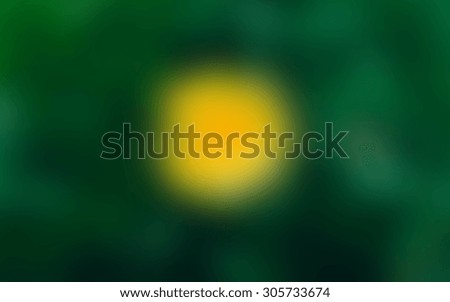 Abstract green blurred defocused photo with dandelion 