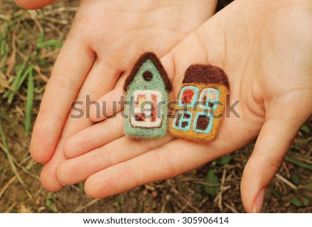houses in hands