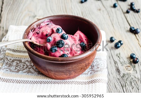 banana ice cream with blueberries, healthy dessert, vegan, rustic background Royalty-Free Stock Photo #305952965