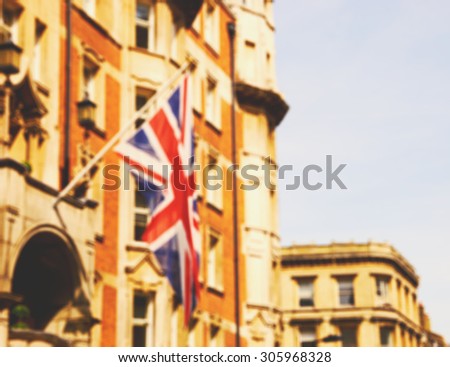 British flag on the building. London, UK.  Blurred toned image.