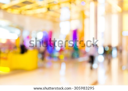 Blurred image of shopping mall and people
