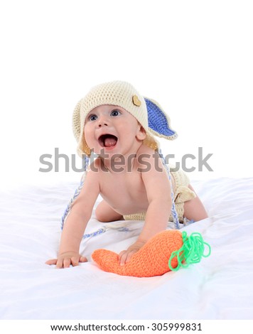funny boy in a rabbit costume with carrot