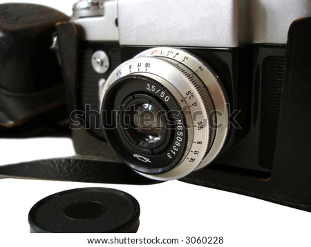 Professional camera with attached zoom lens