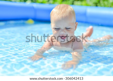 little baby in the water pool