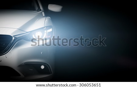 Modern luxury car close-up banner background. Concept of expensive, sports auto. Royalty-Free Stock Photo #306053651