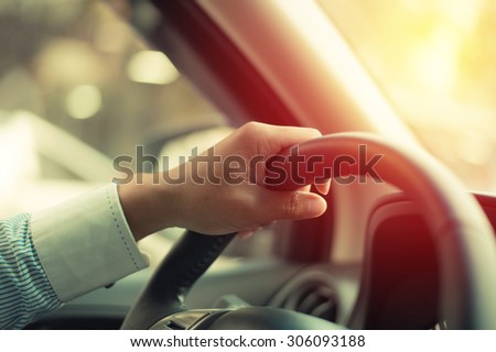 Business man driving car. Vintage filter. Royalty-Free Stock Photo #306093188