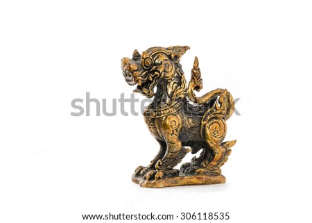 Antique asian art, brass singha, Thailand tradition lion god. perspective view of golden lion