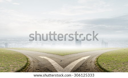 Concept of choice with crossroads spliting in two ways Royalty-Free Stock Photo #306125333