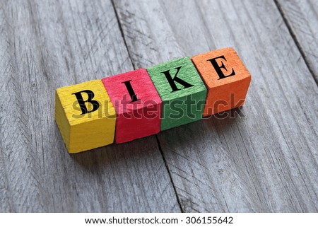 word bike on colorful wooden cubes