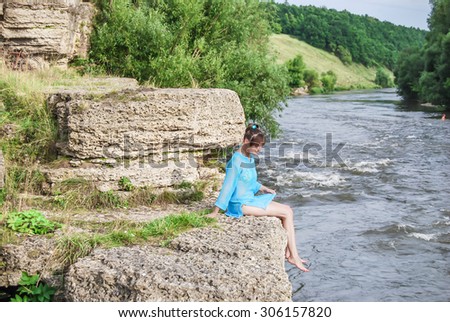 LIPETSK REGION, RUSSIA - 26 JULY, 2015: girl summer hill river