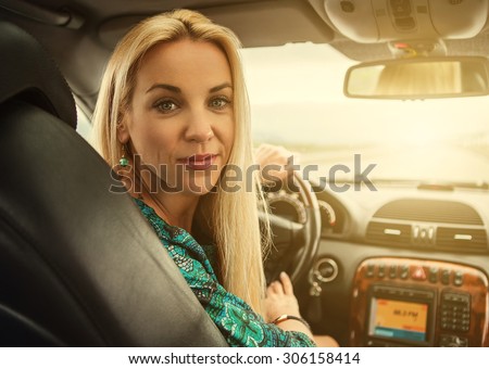 Pretty woman portrait in car
