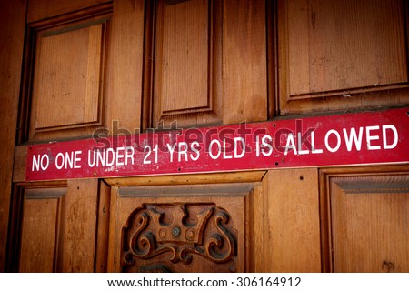 no one under 21 allowed sign on bar door                               